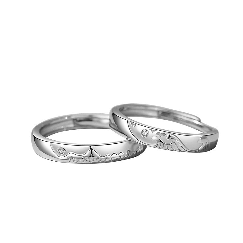 A Pair Of Sterling Silver Couple Rings