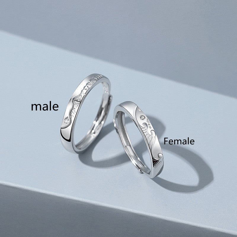 A Pair Of Sterling Silver Couple Rings