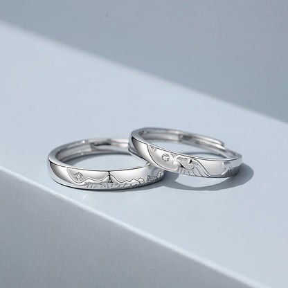 A Pair Of Sterling Silver Couple Rings