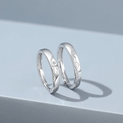 A Pair Of Sterling Silver Couple Rings